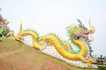 Chinese dragon in the sky and incense holder - Thai temple