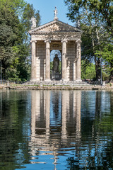 Villa Borghese pond with reflections on the water and fountains