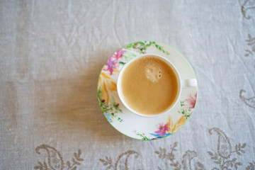 Obraz na płótnie Canvas coffee with milk beautiful Cup top view free space