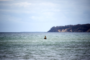 Fisherman in the sea