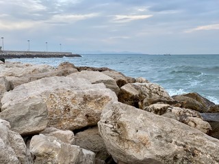 Rocks on seashore in Anzio, Rome, Italy