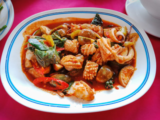 Closeup, Thai spicy squid on white plate