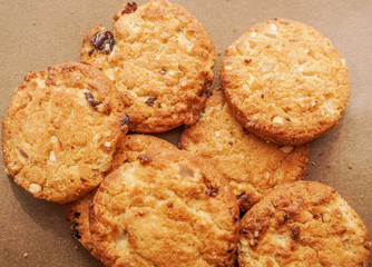 Freshly baked cookies with raisins and cashew nuts