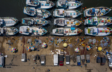 Aerial view of fishing boats and fish market in the south of Sri Lanka