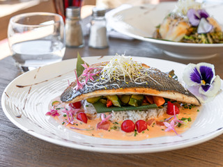 Sea Bream Fish On Restaurant Table Near The Beach