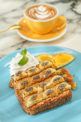 Banana toast served with whipping cream