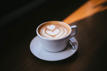 Coffee Latte with sun shining