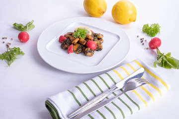 radish and ready-made shrimp dish on a white plate