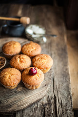 Homemade muffins with a cherry on top. Homemade cupcake. sweet and delicious pastries. Still life.