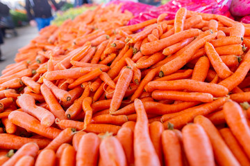 Delicious carrots lies on a turkish market