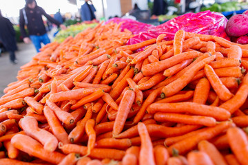Delicious carrots lies on a turkish market
