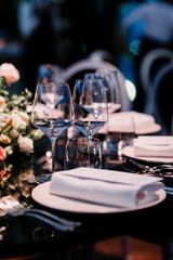 Empty glasses in restaurant. Table setting for celebration