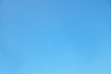 Naklejka na ściany i meble Blue background made of summer clear sky