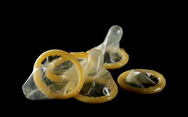 Condom isolated on black background with clipping path