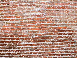 Old red brick wall texture as background
