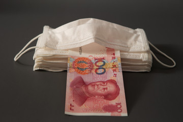 Face mask with Chinese paper currency 