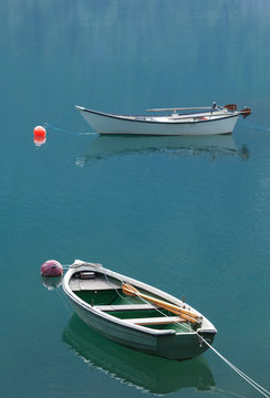 Switzerland, Le Prese, Fishing boats on Lake Poschiavo