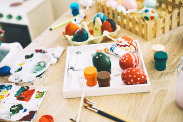 Easter Background. Paints and decorations for coloring eggs