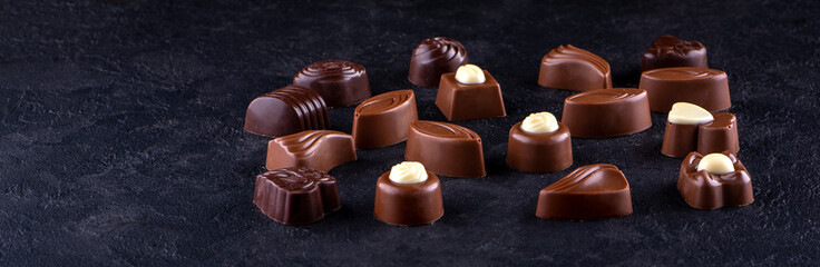 Belgian Chocolate pralines on dark background