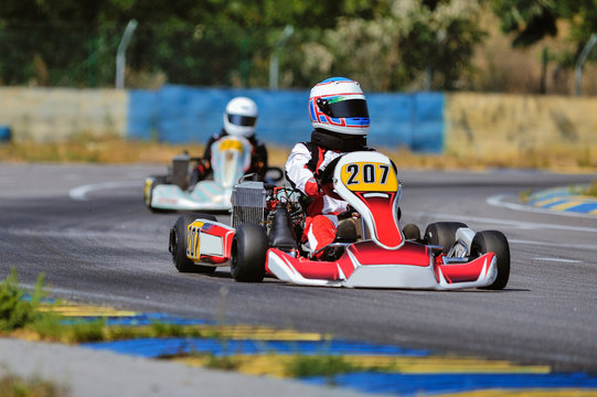 Young Go Cart Racer On Circuit