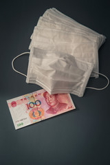 Face mask with Chinese paper currency 