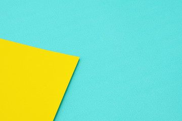 detail of a blue and yellow color paper texture. - background.