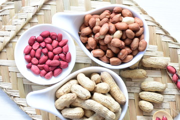 Dried peanuts (Arachis hypogaea) peanuts in shells, whole and chopped in containers