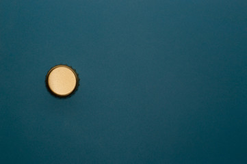 template of bottle cap on blue background front