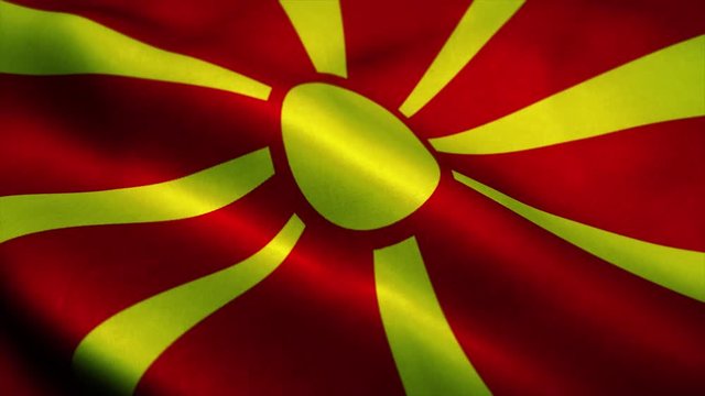 Macedonia flag waving in the wind. National flag of Macedonia. Sign of Macedonia seamless loop animation. 4K