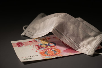 Chinese paper currency, face mask