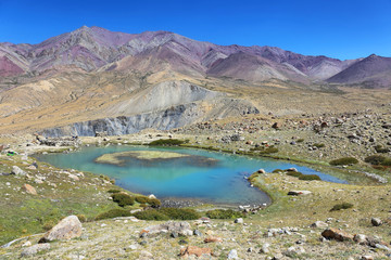 Naklejka na ściany i meble Turquoise lake along Markha valley trek, Ladakh, India