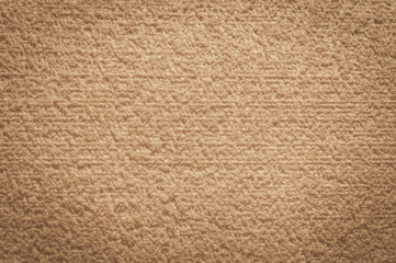 textured textile trendy beige surface for background and wallpaper with dark vignetting gradient