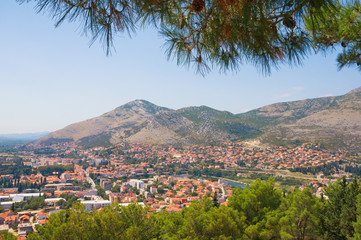 Fototapeta premium Bosnia and Herzegovina, Republika Srpska. View of Trebinje city from Crkvina Hill on sunny summer day