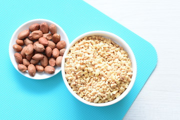 (Arachis hypogaea) chopped peanuts in containers