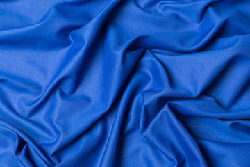 Blue fabric cloth texture. abstract texture background with soft waves.