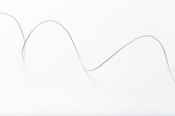white new wire cable isolated on a white background abstraction.