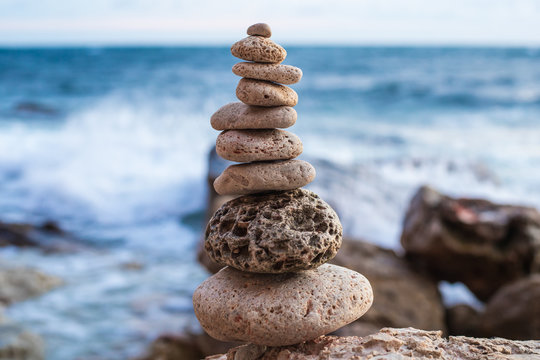 Zen concept. The object of the stones on the beach at sunset. Harmony & Meditation. Zen stones. Relax.