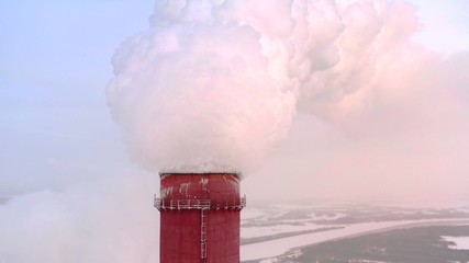 A huge Steam pillar from the power plant or factory pipe, close up.
