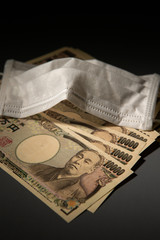 Japanese paper currency with face mask