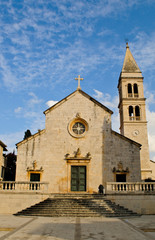 Church of the Annunciation of Mary and bell tower in Supetar on the island of Brac, Dalmatia,...
