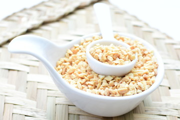 (Arachis hypogaea) chopped peanuts in containers