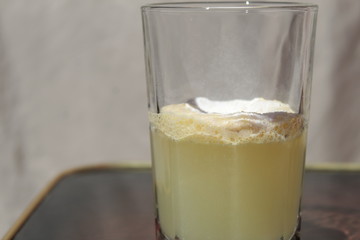 Vitamin powder in a glass with water.