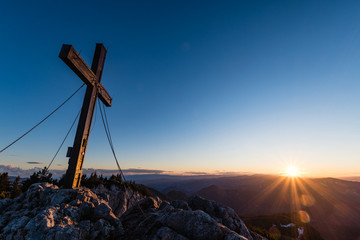summit cross at "Hochlantsch" mountain in Styria, Austria at sunset