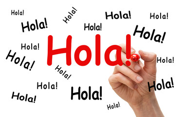 the Spanish word Hola written multiple times on a whiteboard © Erik_AJV