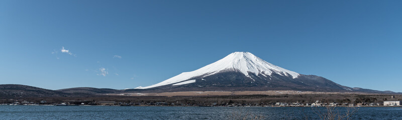 Fototapeta na wymiar Japanese Fuji mountain on blue sky with copy space.