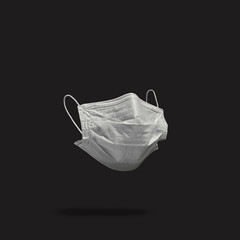 Surgical face mask on color background