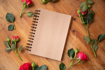 Beautiful flowers on the wooden table. The work of the florist. Flower delivery