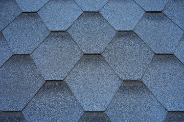 Close up view on asphalt roofing shingles.
