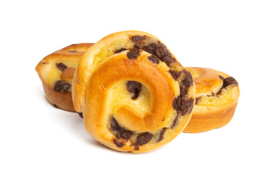 Bun with chocolate drops isolated