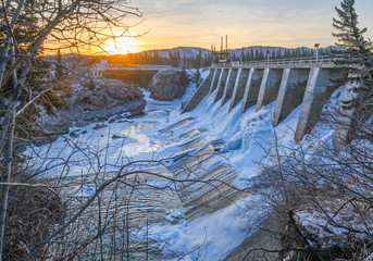Winter view of the Seebe hydroelectric dam near Exshaw, Alberta, Canada